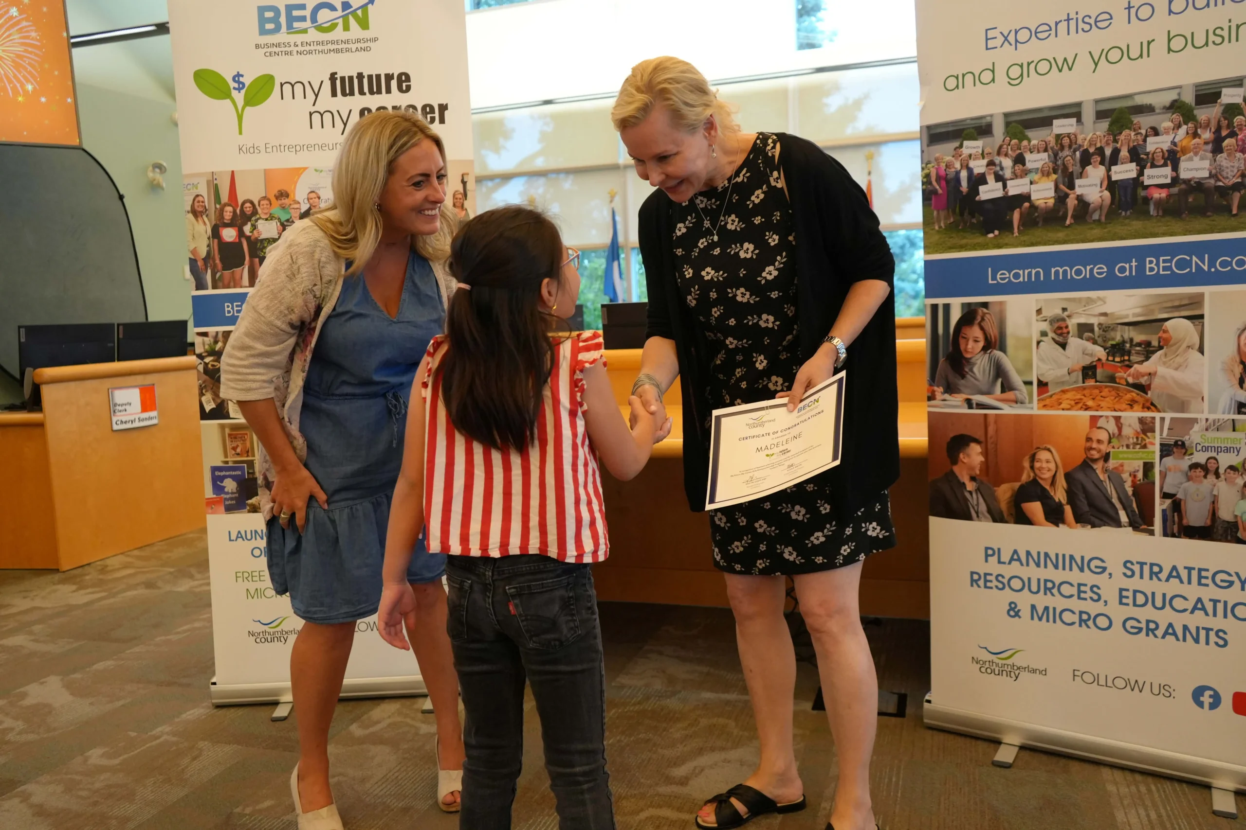 Madeleline receiving her certificate. 